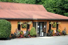 The Kozy Kennels building with flower boxes
